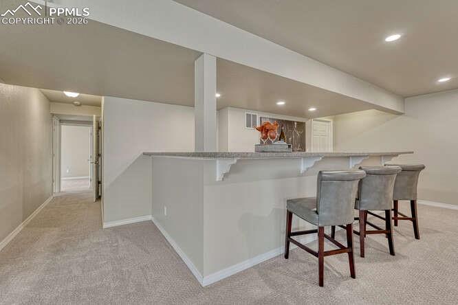 Basement Family room complete with a very large dry bar
