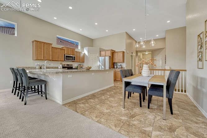 Kitchen area with plenty of natural light and new lighting!