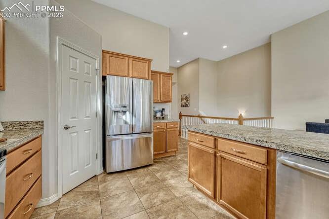 Stainless steel appliances and a Large walk-in pantry.