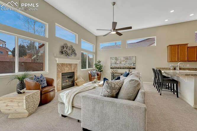 An abundance of windows creates a light and cozy living room.