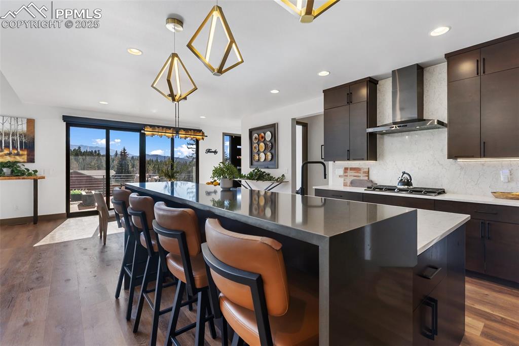 High end finishes and cascading waterfall countertop for a stylish accent!