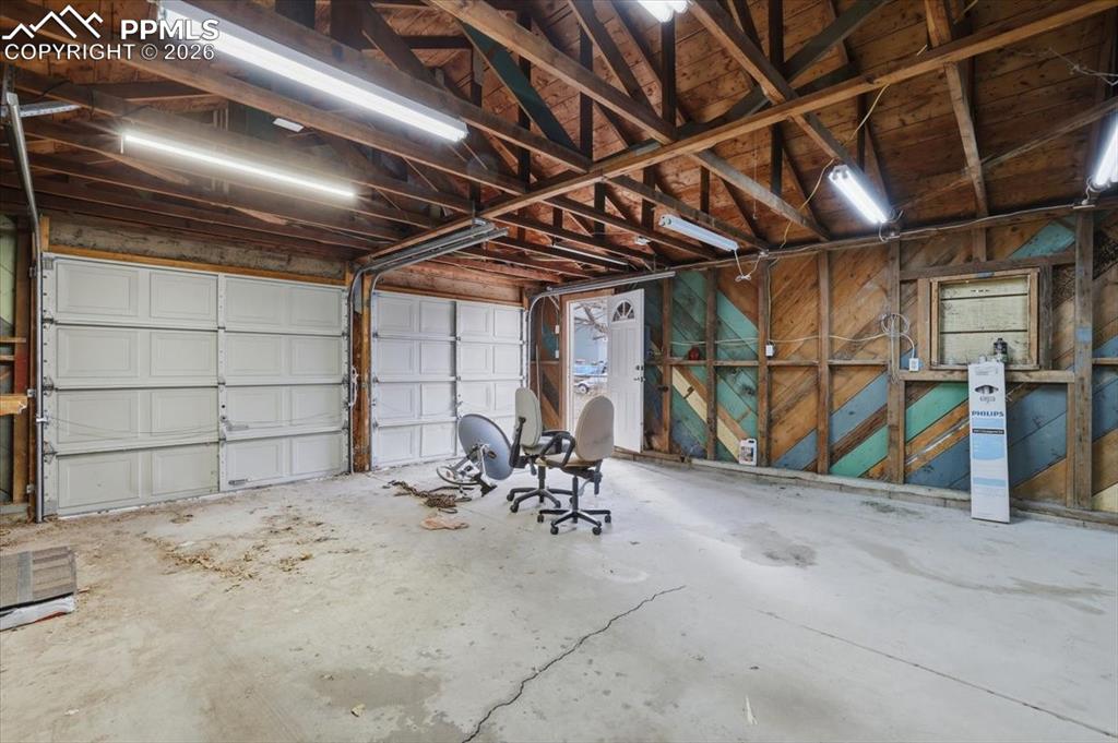 Garage with wooden walls