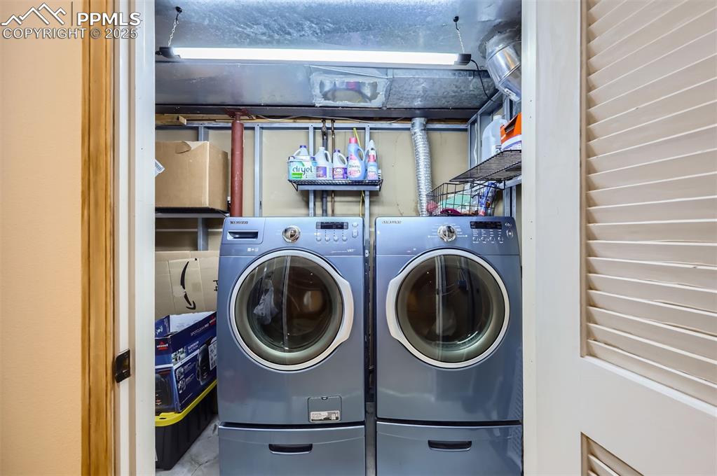 Laundry room with separate washer and dryer