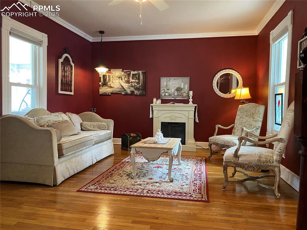 Enjoy the beauty of restored original hardwood floors, a standout feature that highlights the historic charm of this Colorado Springs home.