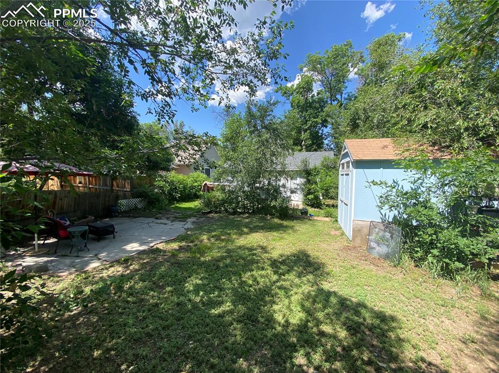 With extra fencing around several garden areas, this home offers protected planting spaces for gardening enthusiasts and outdoor living.