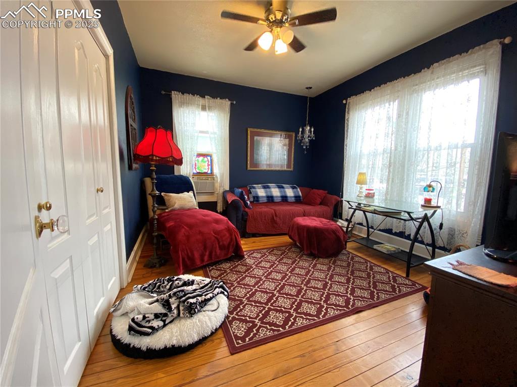 The first of three main-level bedrooms is conveniently located just off the entry