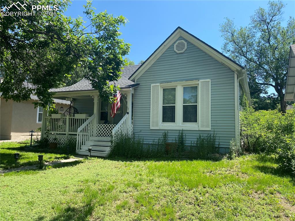 Established mature trees provide ample shade, creating a cool and inviting outdoor living space