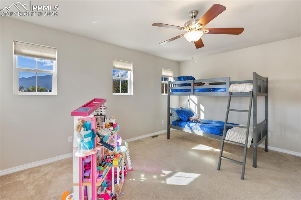 Also on the upper level is another big bedroom with fabulous windows!