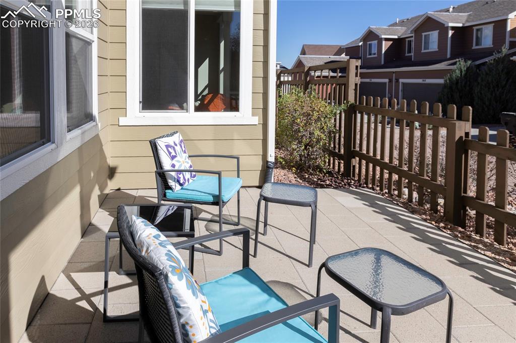 And you will LOVE this sweet, covered front porch too!