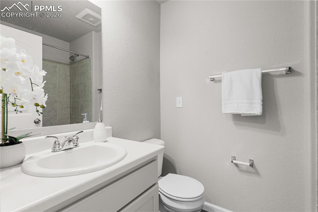 The full upper level bathroom is beautiful.