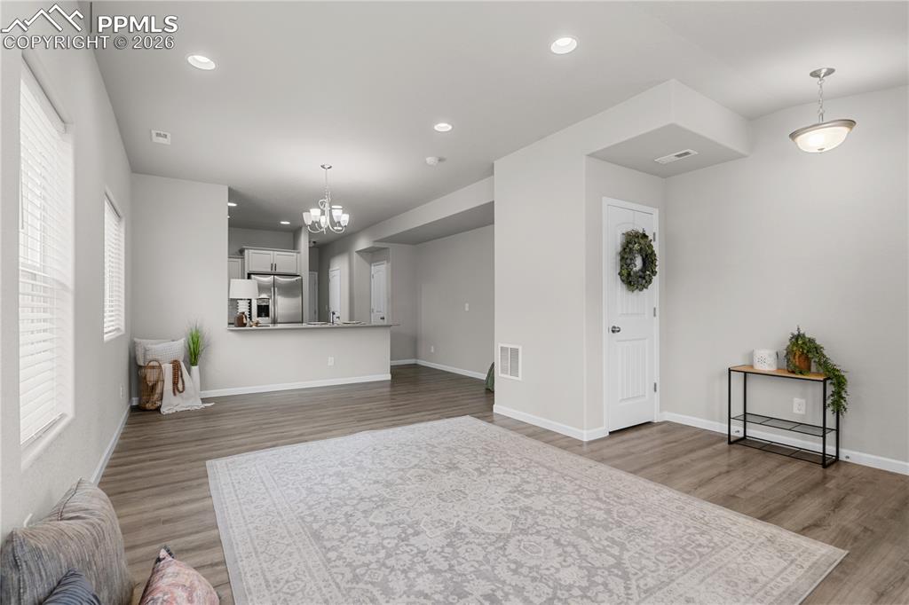Enter to an expansive open concept living, dining combo.  The neutral colors are so inviting.