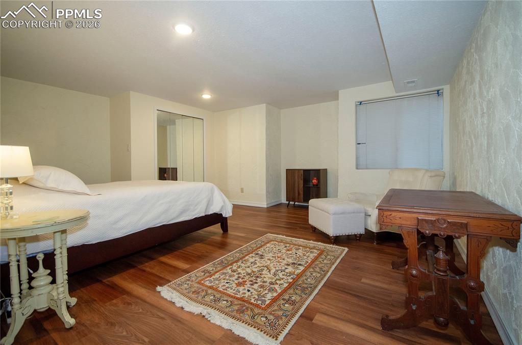 Basement family room, pictured here being used as a bedroom