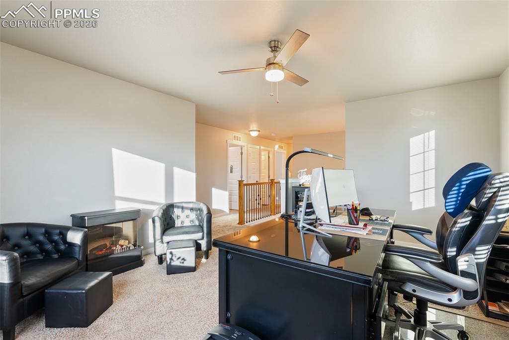 Upper-level loft with flexible layout.
