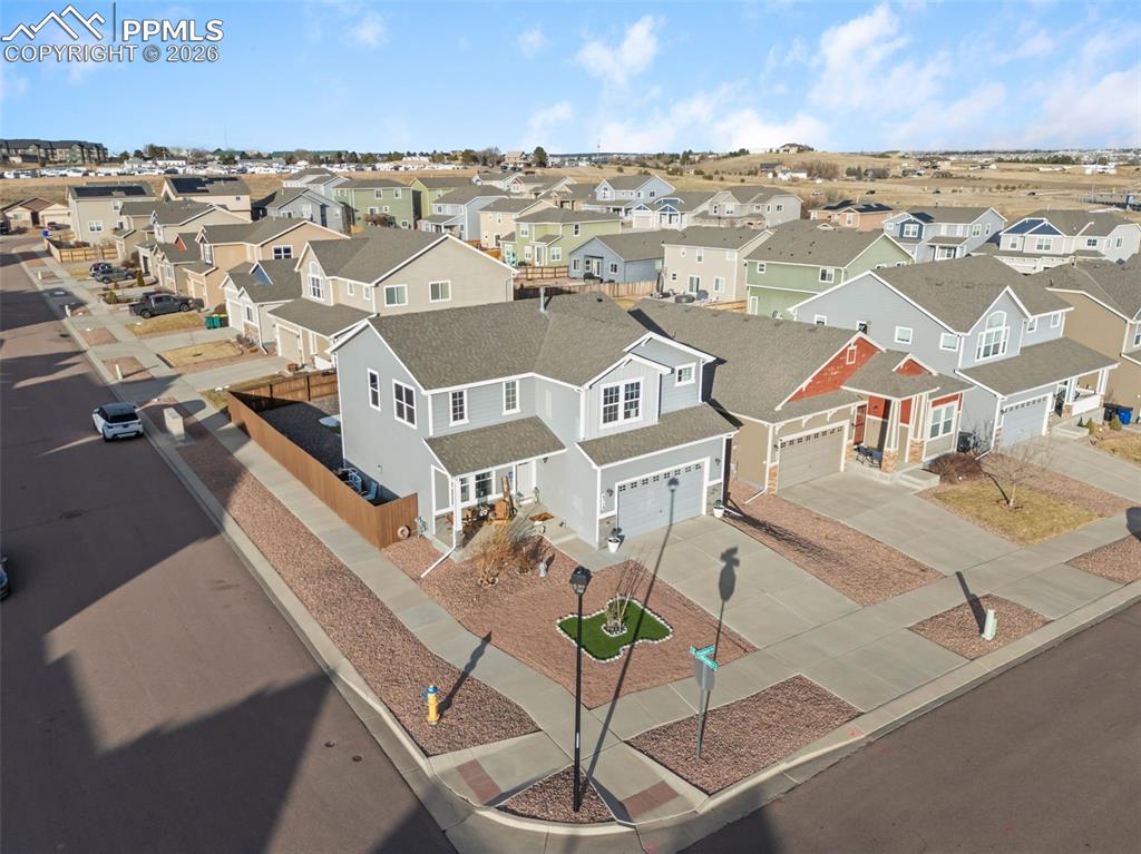 Aerial view highlighting corner-lot setting.