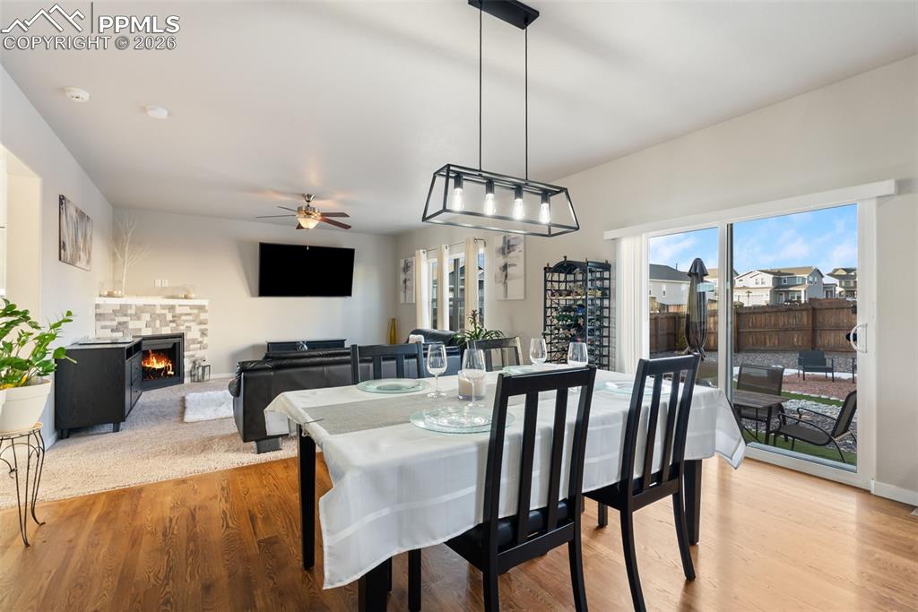Dining area with sliding doors to backyard.