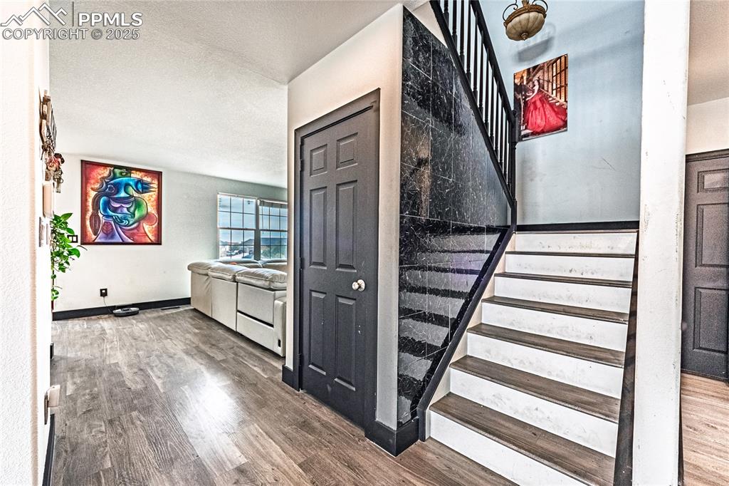 Stairs with wood finished floors