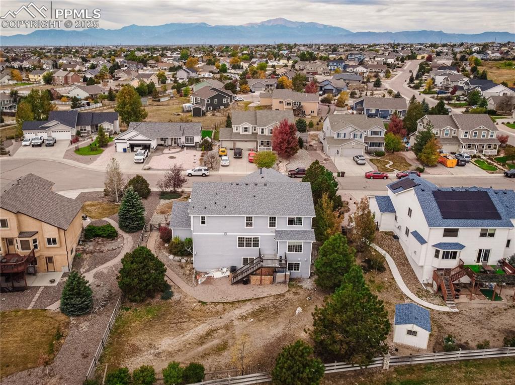 Aerial perspective of suburban area with mountains