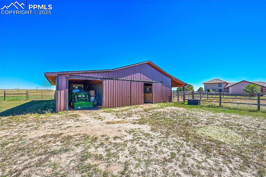 Barn for equipment, stores feed, hay, livestock