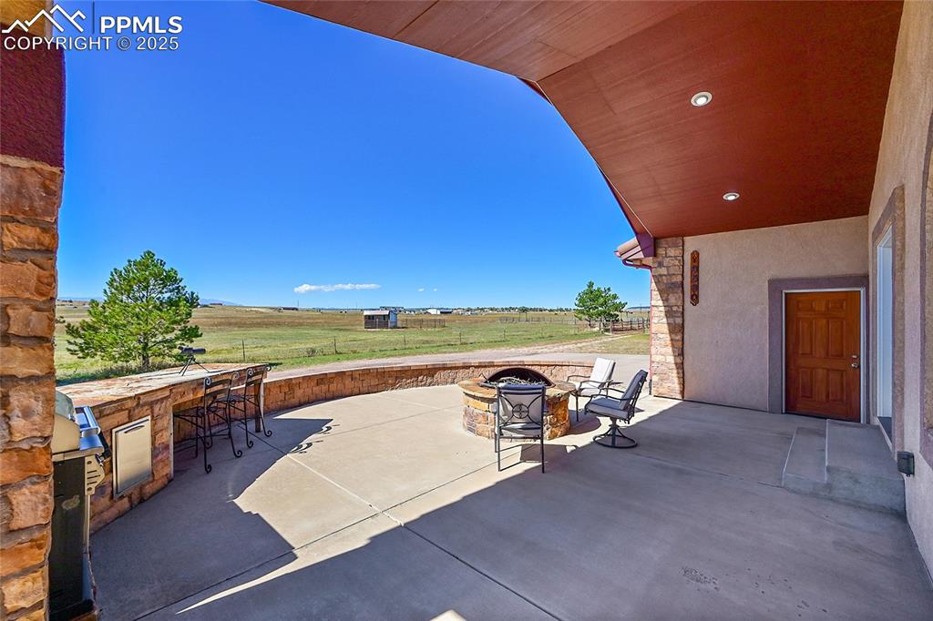 Enjoy watching the sunset over the mountain with a nice fire