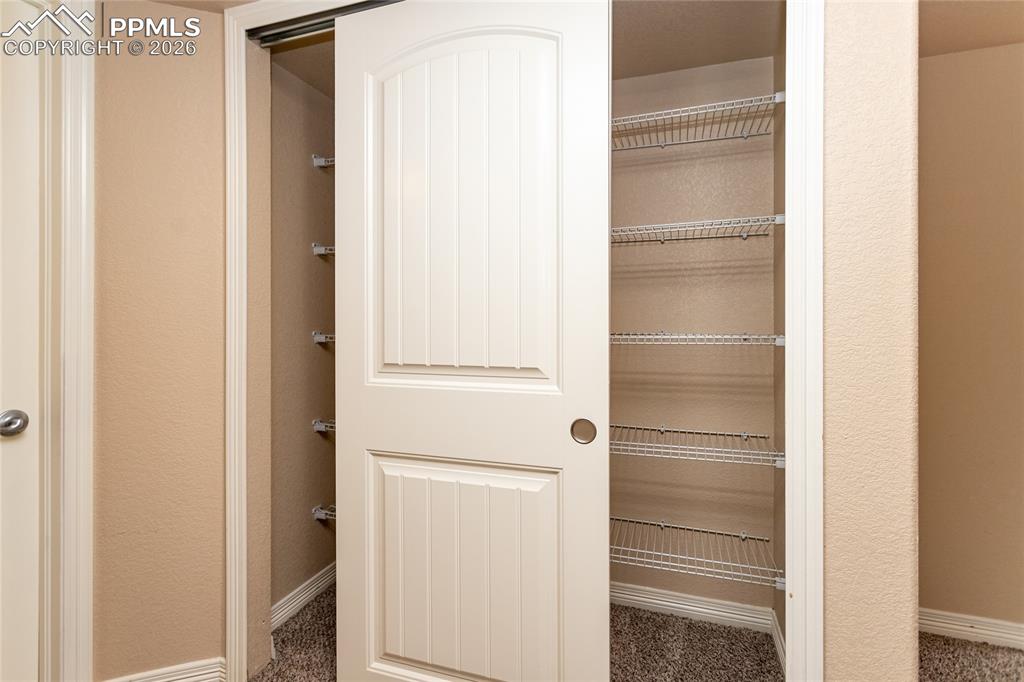 Extra closet in primary bedroom
