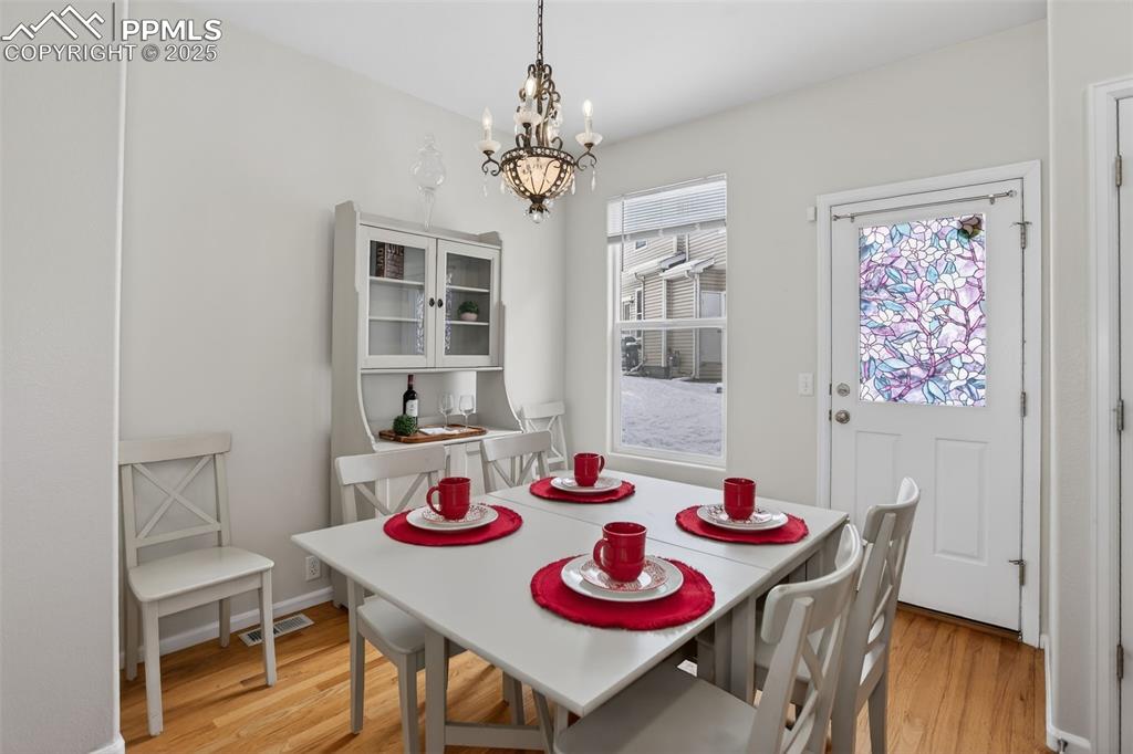 Dining space right off the kitchen with access to the back of the structure.