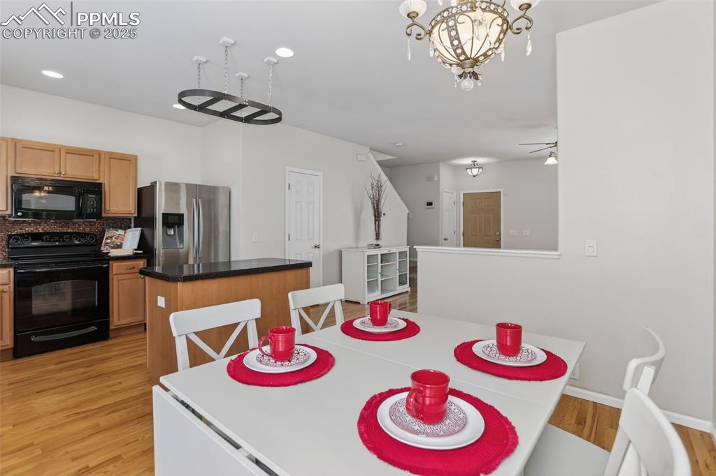 Dining space right off the kitchen with access to the back of the structure.