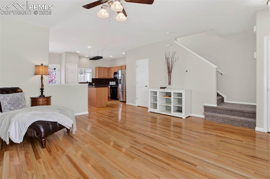 Spacious and bright living room with hardwood flooring!