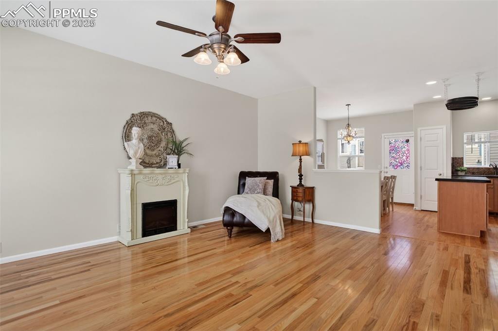 Spacious and bright living room with hardwood flooring!