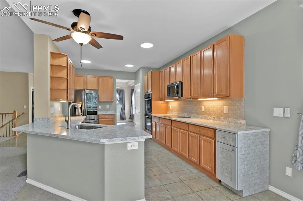 Large kitchen with tile flooring