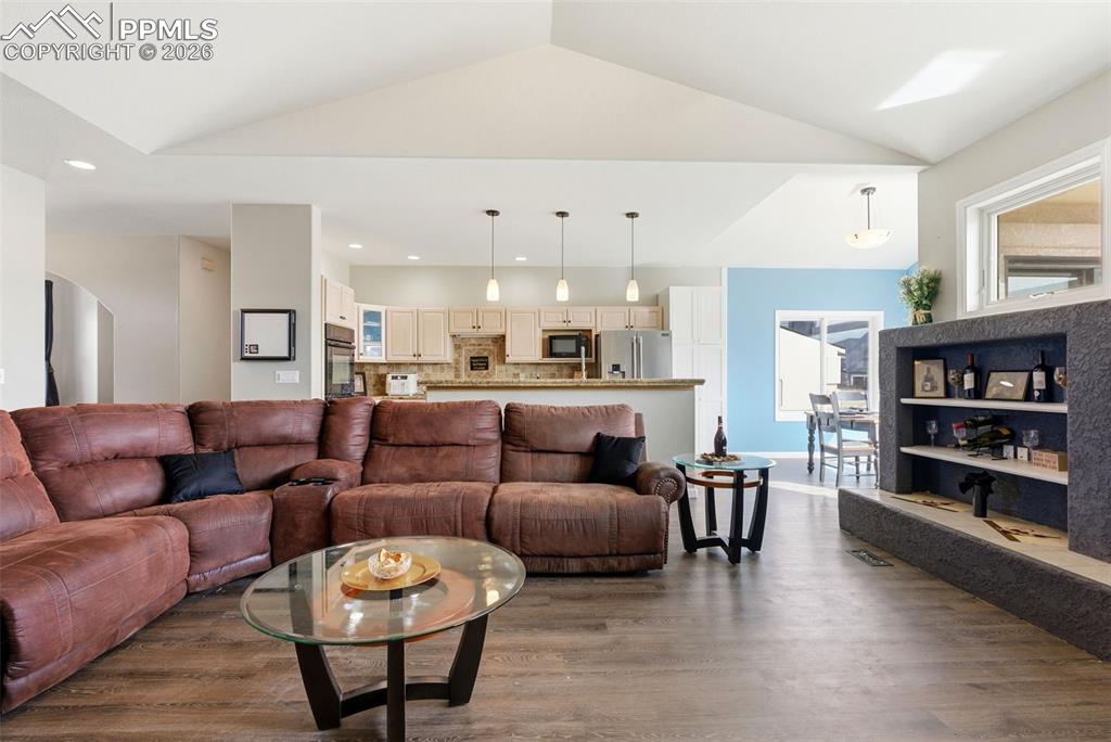 Living area is a grand great room open floor plan