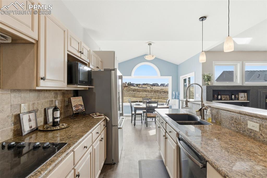 Kitchen flows into Informal Dining Area