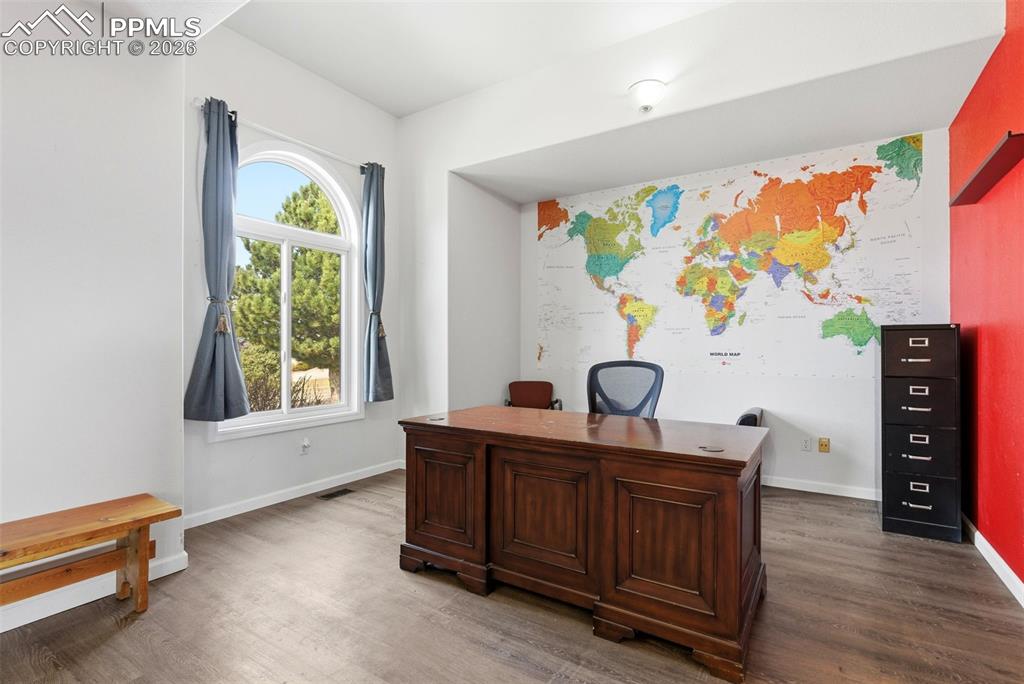 Office has natural light from window 