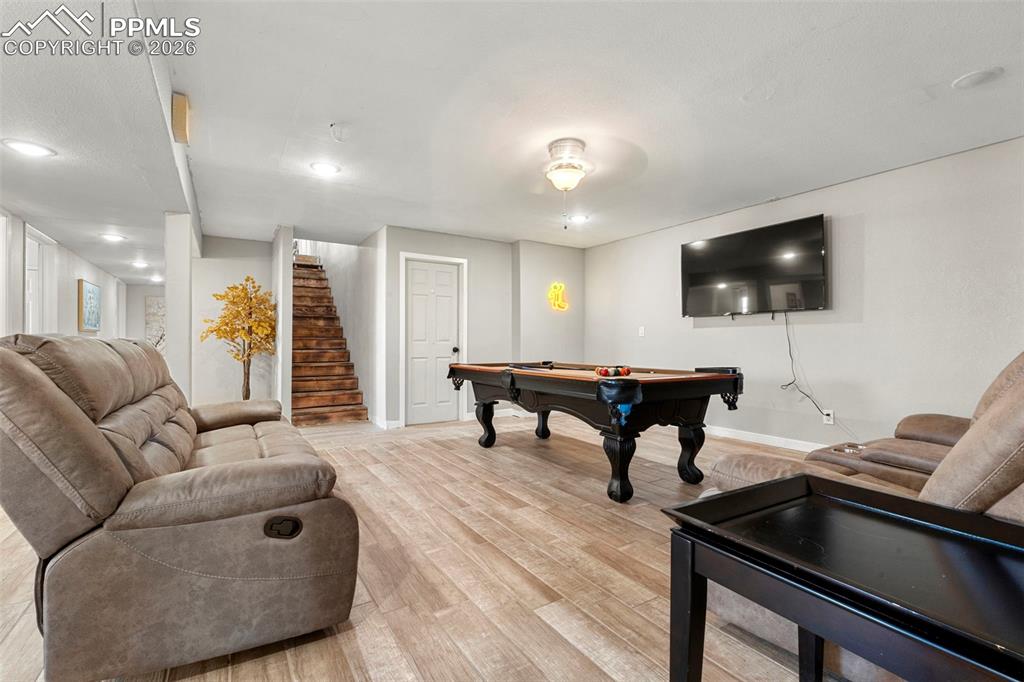 Playroom featuring light wood-style flooring, billiards, and recessed lighting