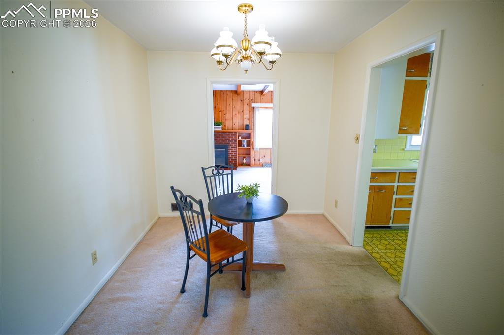 Nice dining area with wall space for a hutch, opens to the kitchen and 2nd living area