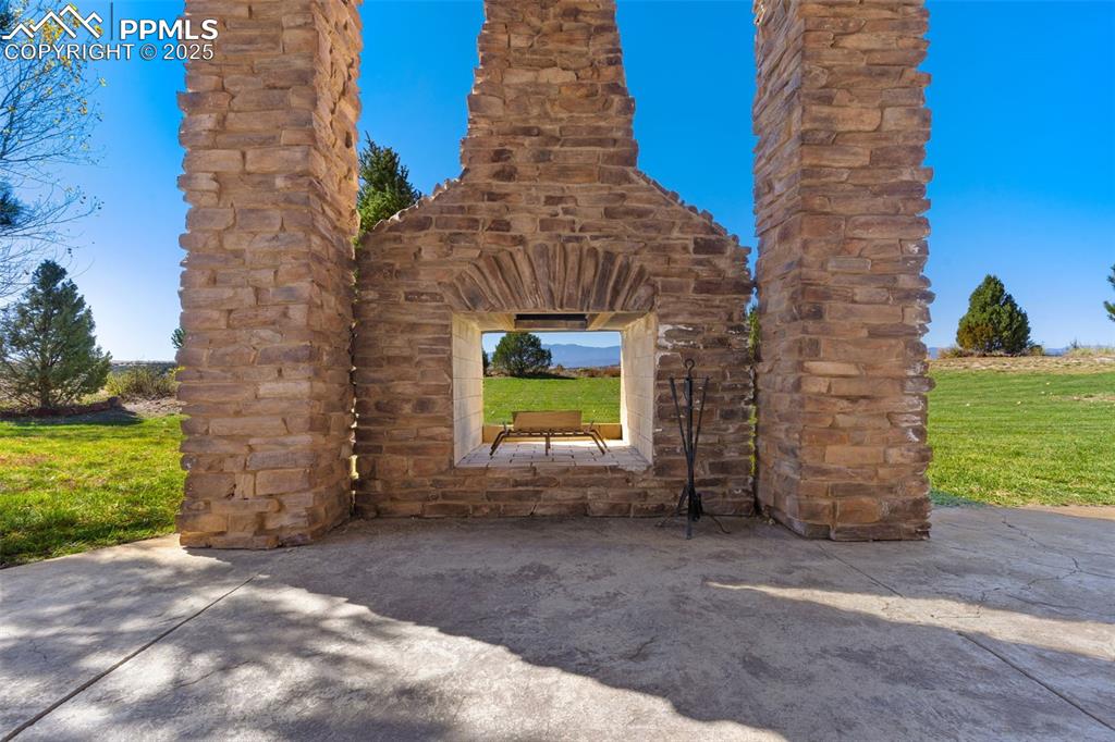 Stunning outdoor fireplace off the patio from the walkout basement.