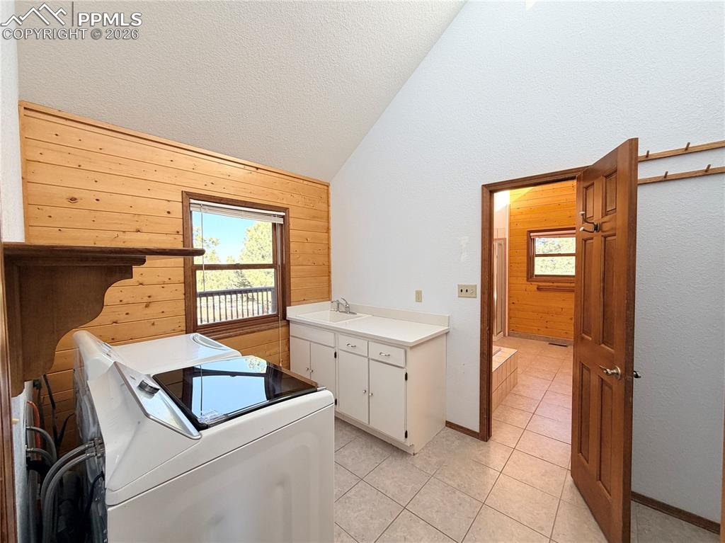 Laundry between dining and master bathroom