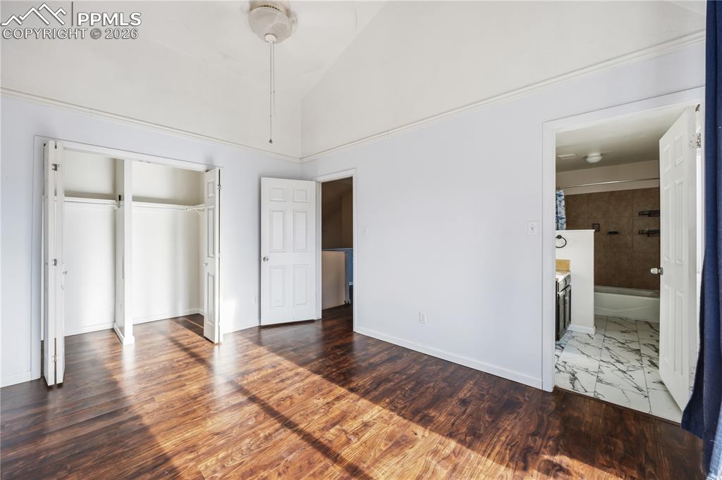 The primary bedroom has a deep closet and an adjoining full bathroom