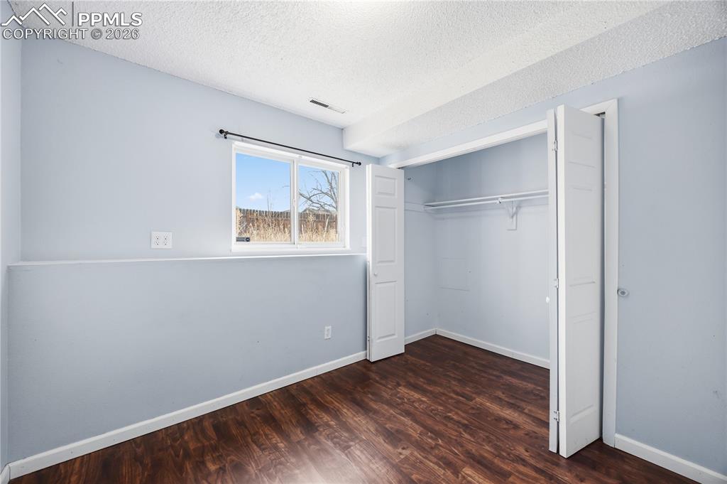 Lower level bedroom #2 has LVP flooring and a generous closet.