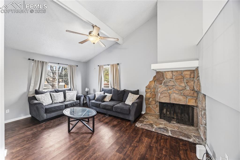 Cozy up on chilly nights to the wood burning fireplace with stone surround.