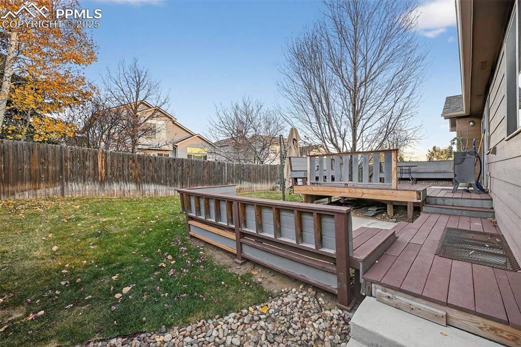 Additional seating area around a perfect spot for a fire pit or a hot tub!