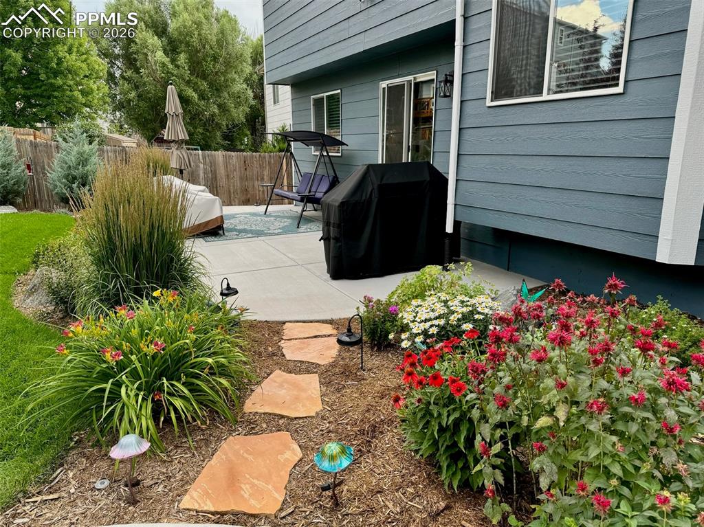 Mature plants and trees throughout the nab, front and side of the yard.