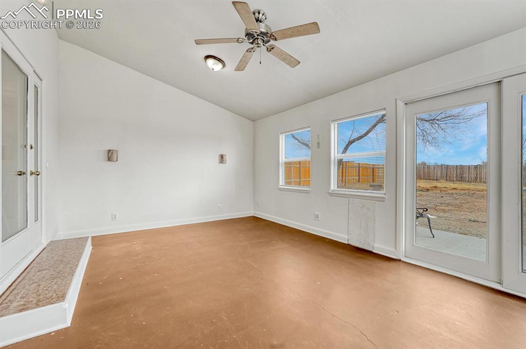 Finished and heated sunroom with walkout to backyard. So many possibilities for this space!