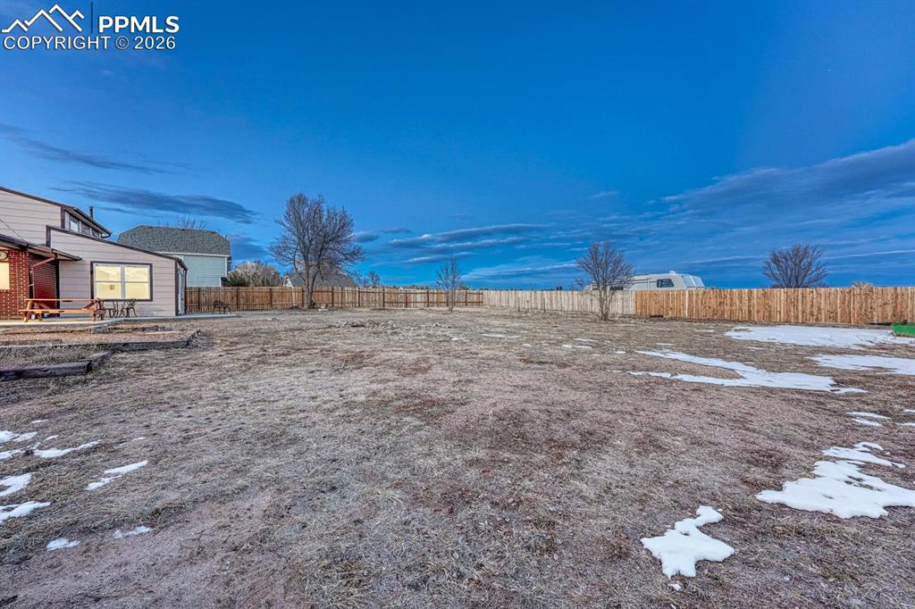 A portion of the 2.5 acres has a privacy fence but the property goes beyond the fence.