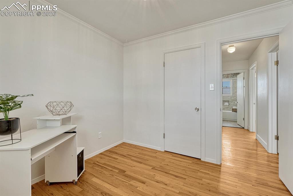 Bedroom 3 with walk-in closet. Also faces west