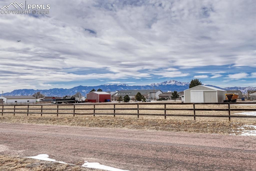 Front of the house with sweeping front range views and perfect Pikes Peak views!