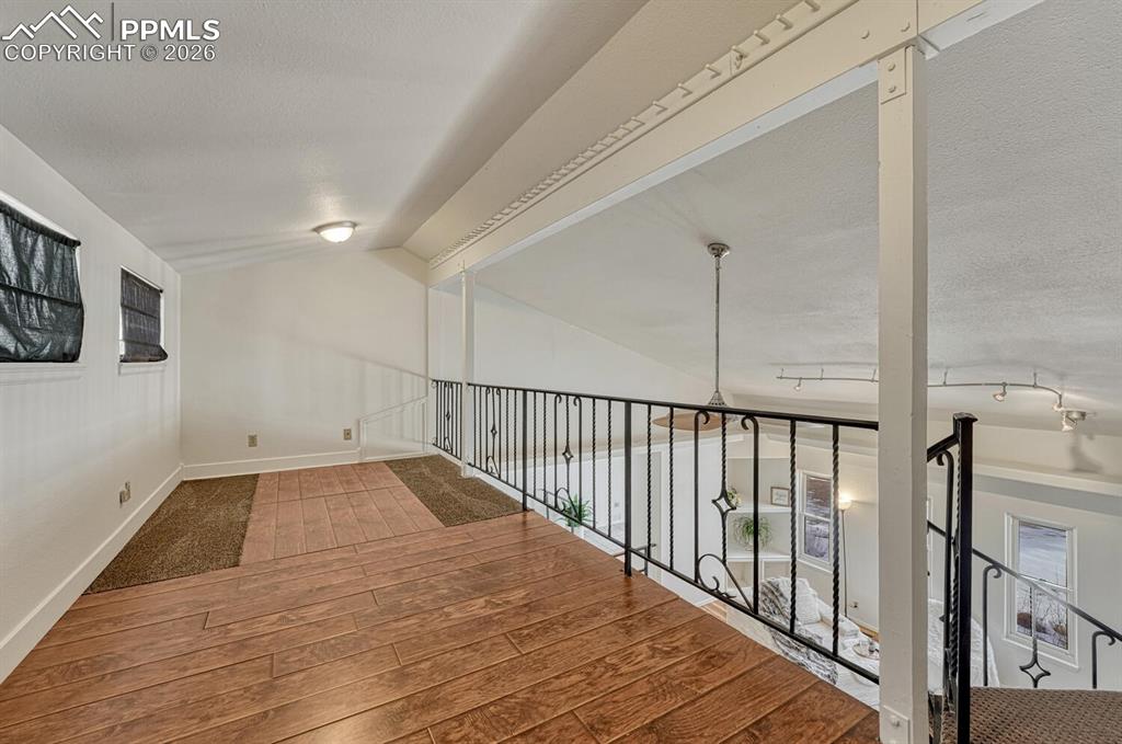 loft above living room. Game zone, library, office, craft corner? Tons of possibilities! 