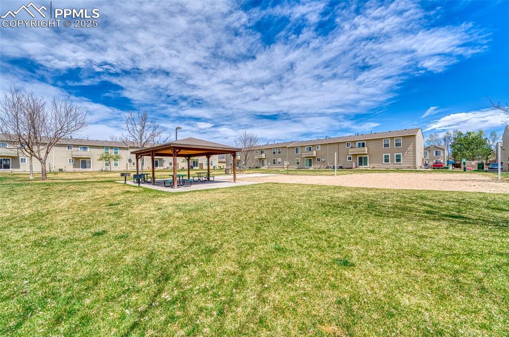 View of community with a yard and a gazebo