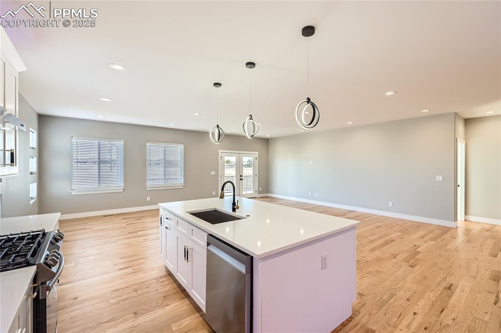 Another view of this spectacular kitchen, which is open to the living room and dining area!