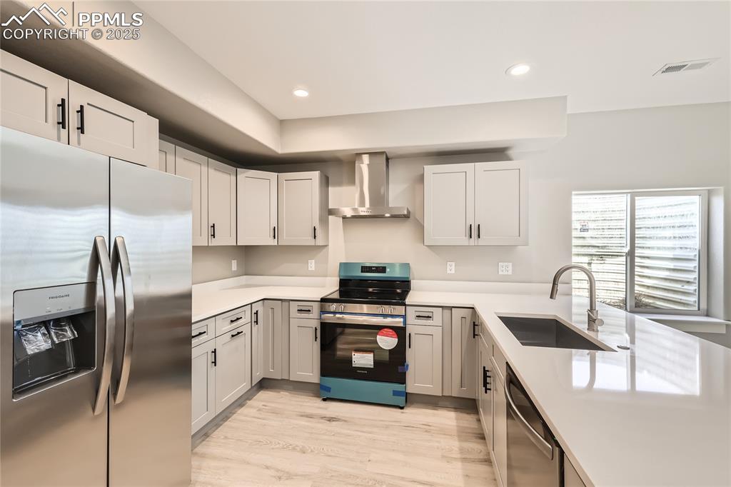 Check out this awesome kitchen! It provides shaker style cabinetry, soft-close Euro style doors/drawers, quartz countertop, stainless steel appliances and a peninsula with lots of seating.