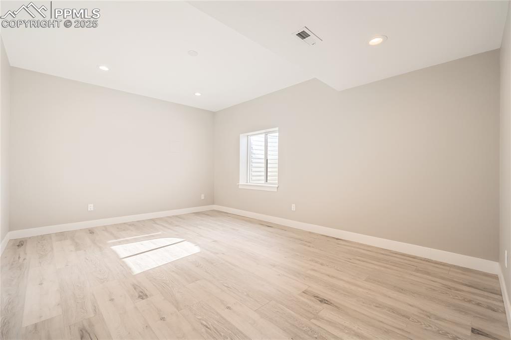 Here's the 3rd primary suite, with an ensuite bathroom and HUGE walk-in closet! Bedroom #4.